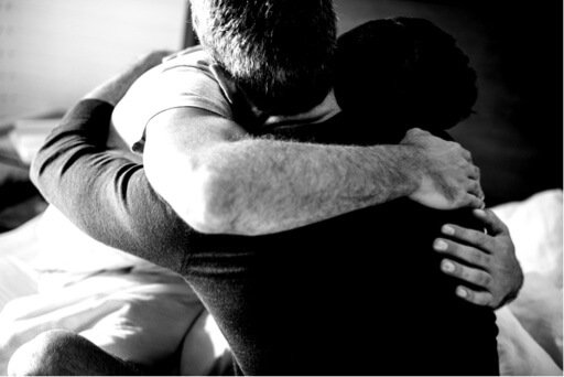Men hugging